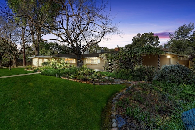 view of front of home featuring a front yard