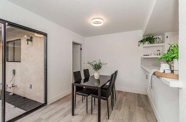720 E Magill Ave, Fresno, CA 93710 - dining room with light wood finished floors
