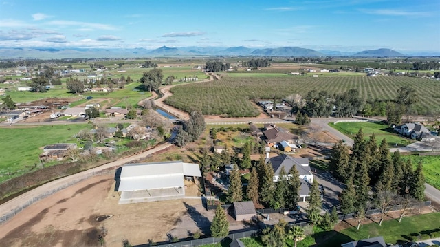 aerial view featuring a rural view and a mountain view