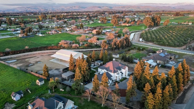 birds eye view of property with a mountain view