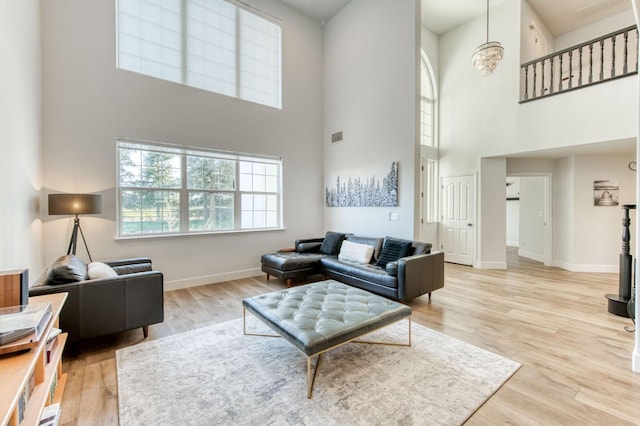 living room with wood finished floors and baseboards