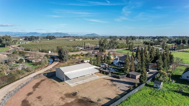 bird's eye view with a rural view and a mountain view