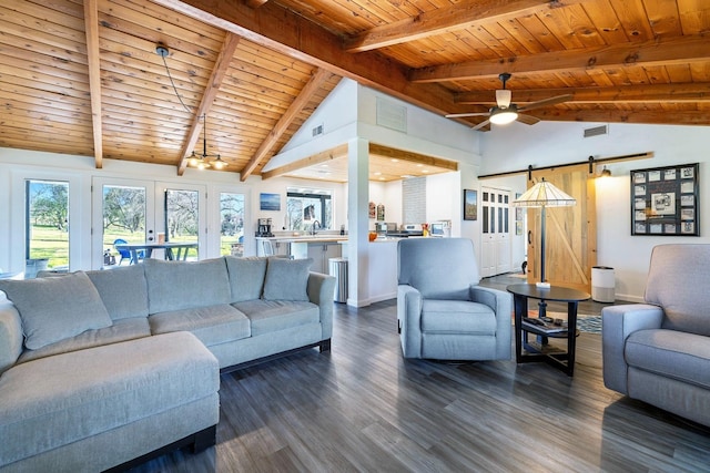 living area with dark wood-style flooring, visible vents, a barn door, a ceiling fan, and wood ceiling