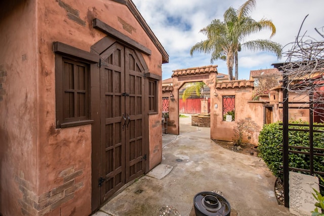 view of patio / terrace featuring fence