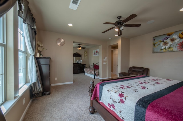 bedroom featuring recessed lighting, visible vents, carpet flooring, ceiling fan, and baseboards