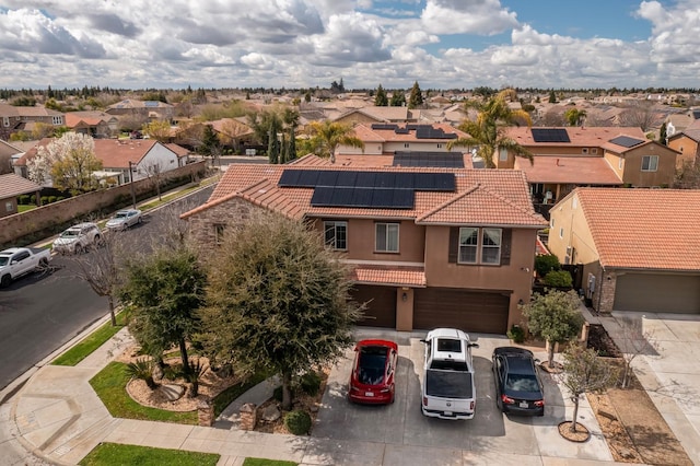 birds eye view of property with a residential view