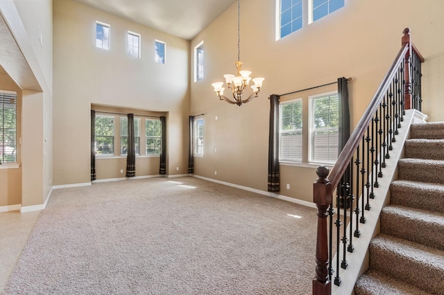 2188 Whiteash Ave, Clovis, CA 93619 - entryway with a chandelier, a towering ceiling, plenty of natural light, and stairway