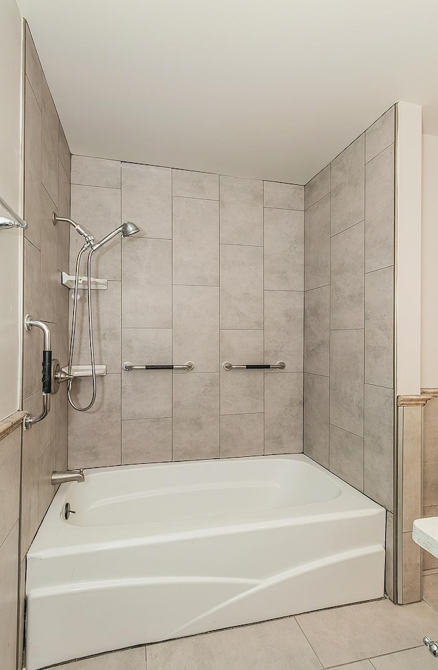 full bath with tile patterned flooring and shower / washtub combination