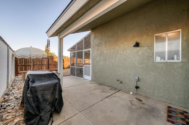 view of patio / terrace with fence and grilling area