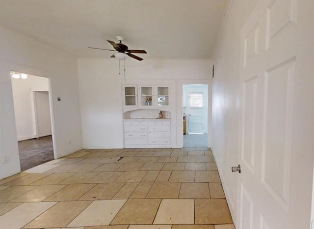 683 E Polk St, Coalinga, CA 93210 - unfurnished room featuring a ceiling fan and light tile patterned flooring