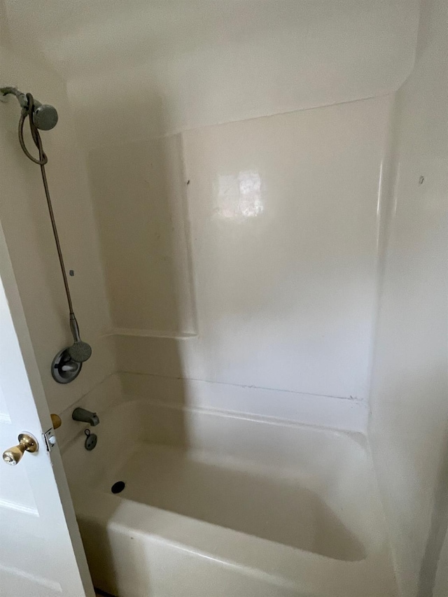 bathroom with shower / bathing tub combination