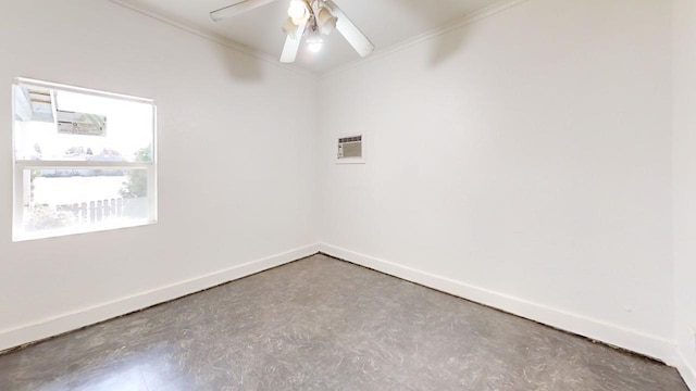683 E Polk St, Coalinga, CA 93210 - spare room featuring crown molding, ceiling fan, concrete floors, and baseboards