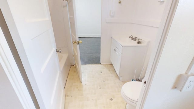 683 E Polk St, Coalinga, CA 93210 - bathroom with toilet and vanity