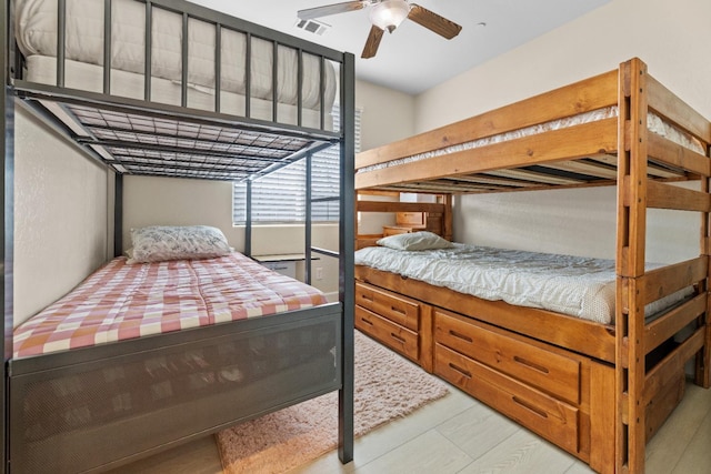 bedroom with visible vents and ceiling fan