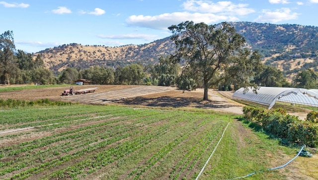 property view of mountains featuring a rural view