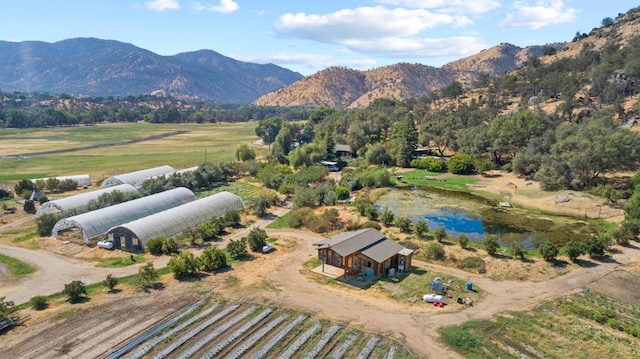 bird's eye view with a mountain view and a rural view