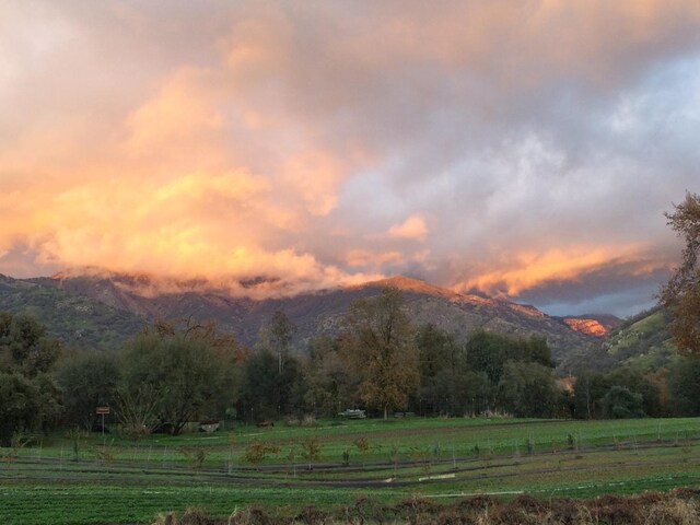 view of mountain feature featuring a rural view