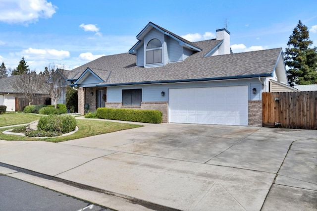 view of front of property with a garage, brick siding, a shingled roof, fence, and driveway