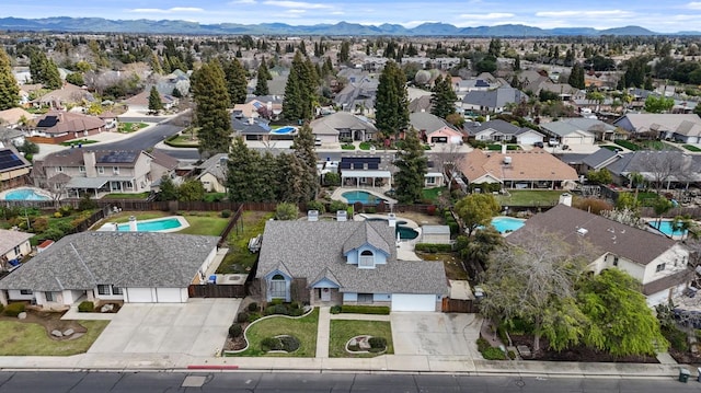 aerial view featuring a residential view and a mountain view