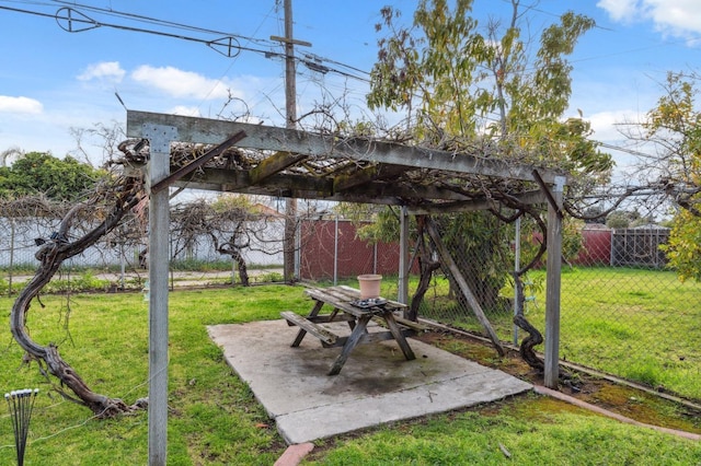 view of yard with fence and a patio