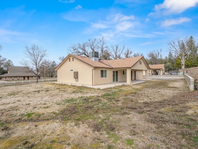 40023 Woodsong Way, Oakhurst, CA 93644 - back of house with fence and stucco siding