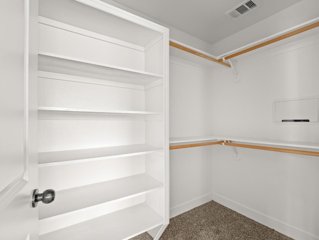 40023 Woodsong Way, Oakhurst, CA 93644 - walk in closet featuring carpet and visible vents