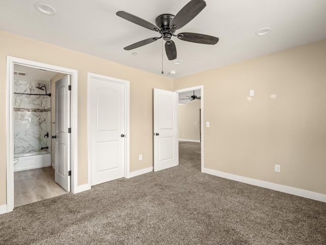 40023 Woodsong Way, Oakhurst, CA 93644 - unfurnished bedroom with a ceiling fan, connected bathroom, baseboards, and carpet flooring