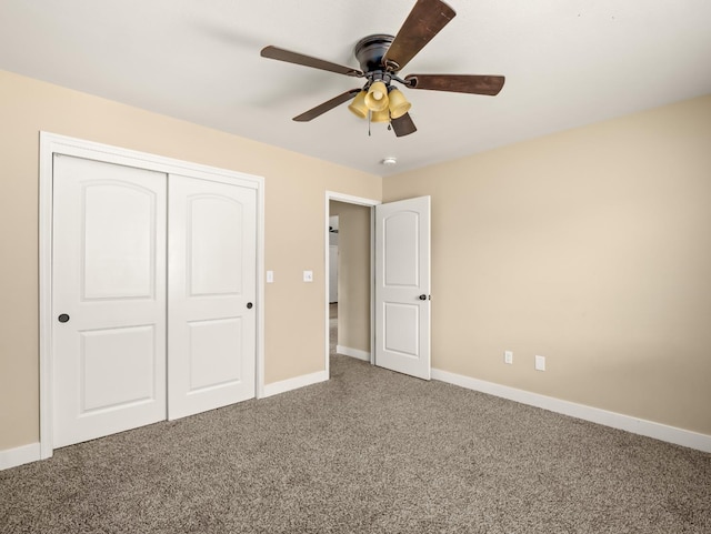 40023 Woodsong Way, Oakhurst, CA 93644 - unfurnished bedroom with carpet floors, a closet, baseboards, and a ceiling fan