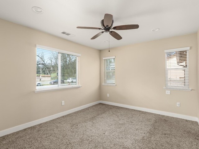 40023 Woodsong Way, Oakhurst, CA 93644 - unfurnished room with a ceiling fan, baseboards, visible vents, and carpet flooring