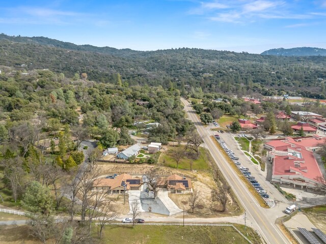 40023 Woodsong Way, Oakhurst, CA 93644 - birds eye view of property with a forest view and a mountain view