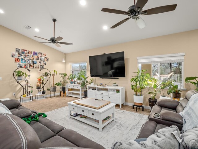 40023 Woodsong Way, Oakhurst, CA 93644 - living room with recessed lighting, light colored carpet, visible vents, vaulted ceiling, and baseboards