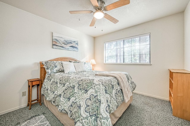 40531 Saddleback Rd, Bass Lake, CA 93604 - carpeted bedroom featuring baseboards, a textured ceiling, and a ceiling fan