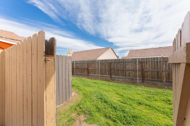 view of yard featuring fence