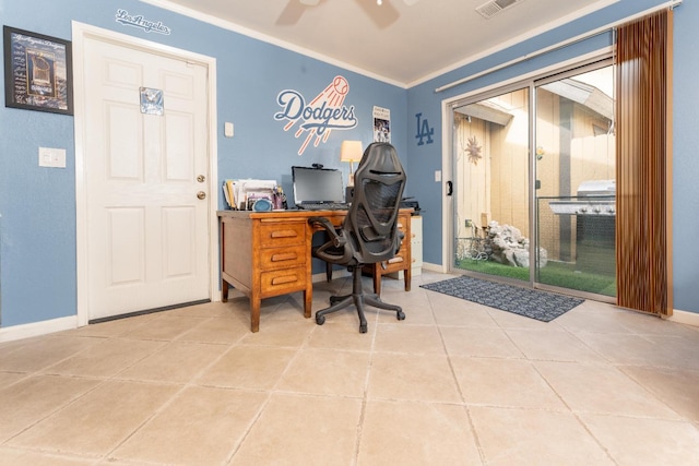 tiled office featuring ornamental molding, visible vents, baseboards, and a ceiling fan