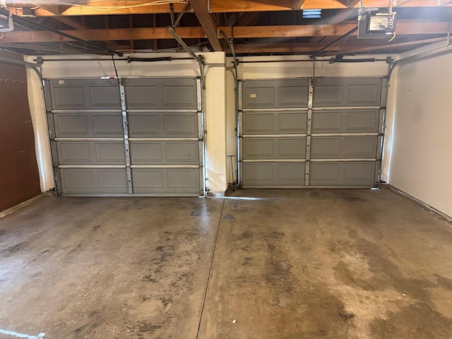 garage featuring a garage door opener