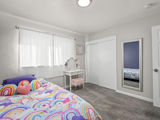 carpeted bedroom featuring a closet