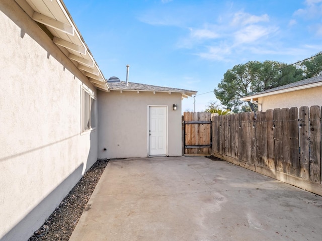 view of patio with fence