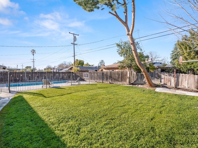 view of yard featuring a fenced backyard and a fenced in pool