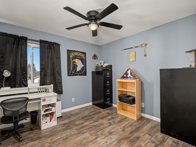 office with wood finished floors, a ceiling fan, and baseboards