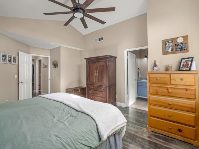 bedroom featuring high vaulted ceiling, connected bathroom, visible vents, baseboards, and dark wood-style floors