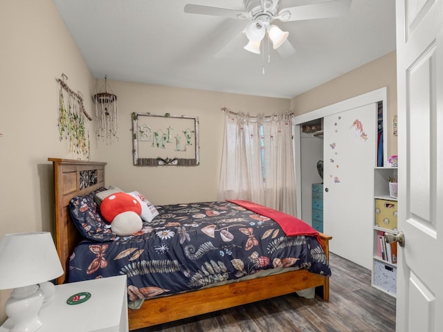 bedroom featuring a closet, a ceiling fan, and wood finished floors