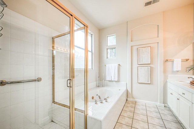 full bath featuring a stall shower, visible vents, a tub with jets, tile patterned flooring, and vanity