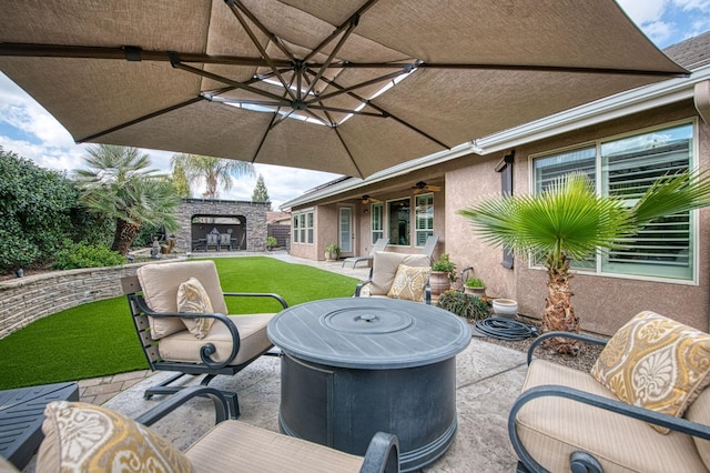 view of patio / terrace with a ceiling fan