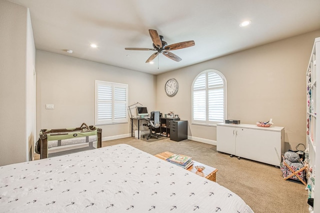 bedroom featuring recessed lighting, light carpet, ceiling fan, and baseboards