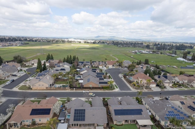 birds eye view of property with a residential view