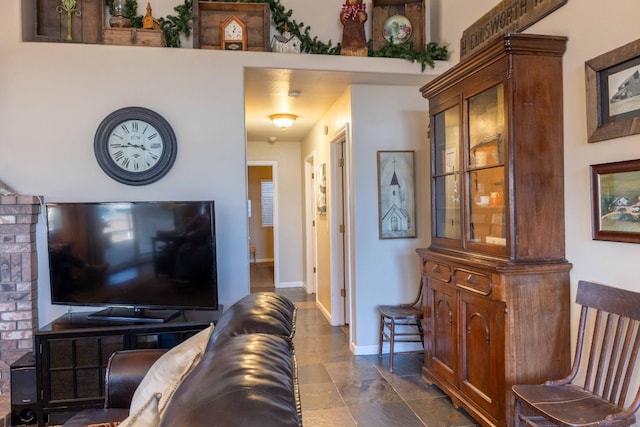 living room featuring baseboards