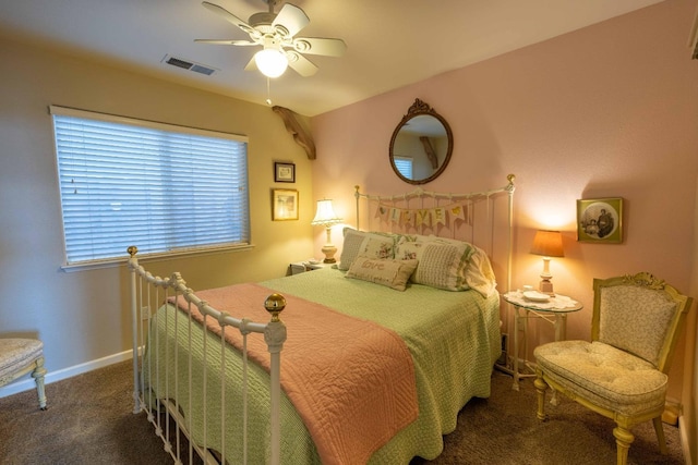 carpeted bedroom with ceiling fan, visible vents, and baseboards