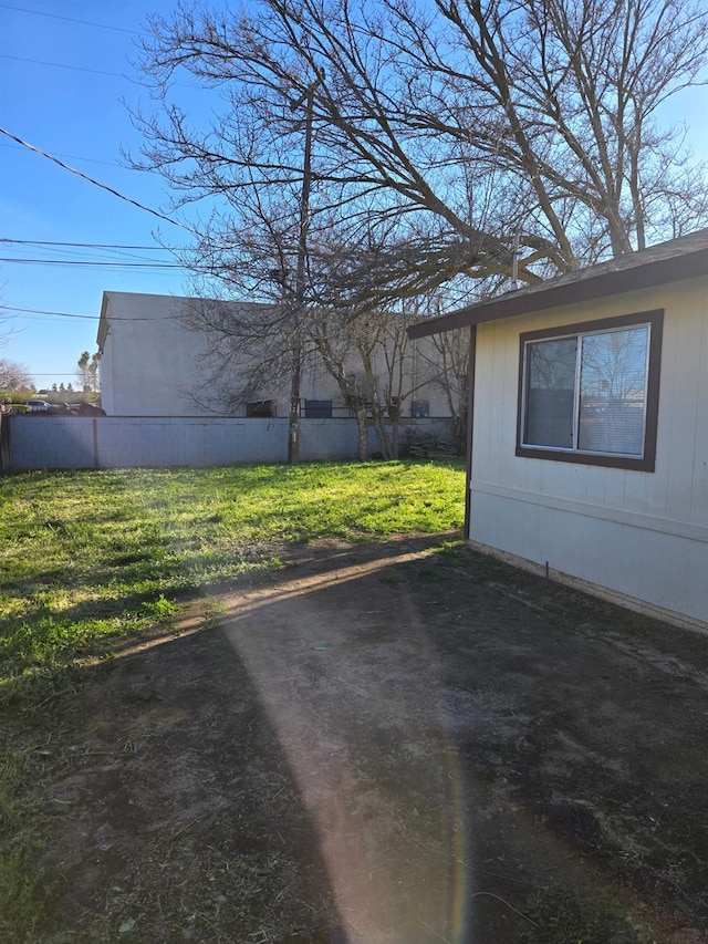 view of yard with fence