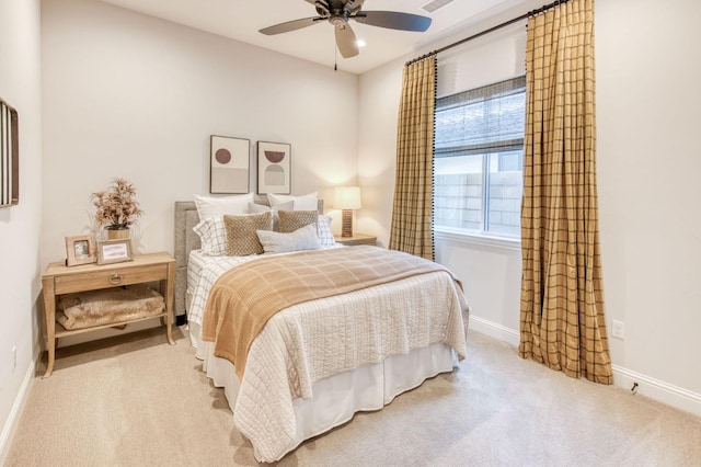 bedroom featuring light carpet, recessed lighting, a ceiling fan, and baseboards