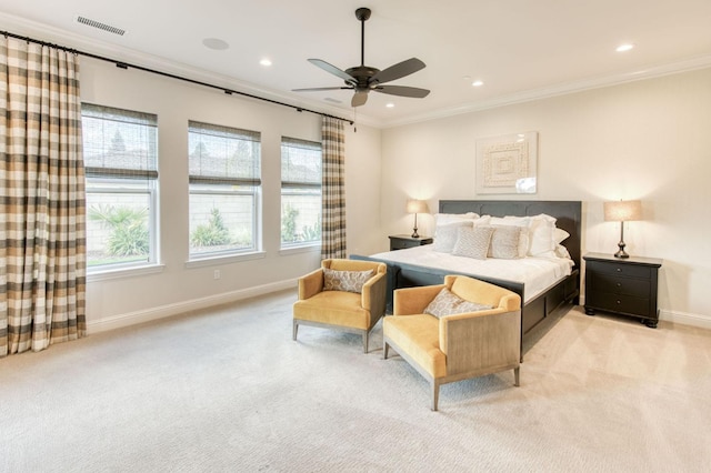 bedroom featuring light carpet, baseboards, and crown molding